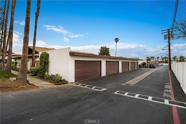 garage featuring fence