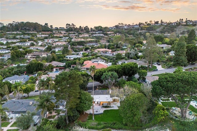 aerial view at dusk with a residential view