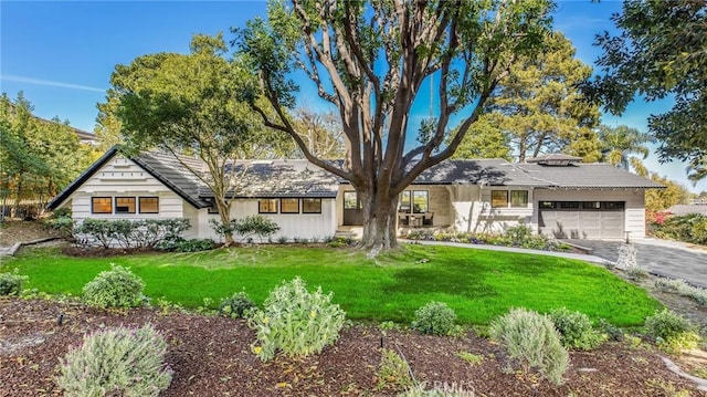 5353 Middlecrest Rd, Rancho Palos Verdes, CA 90275 - view of front of property featuring an attached garage, a front lawn, and driveway