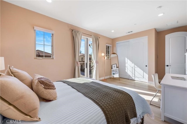 bedroom featuring baseboards, visible vents, access to exterior, a closet, and recessed lighting