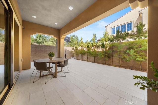 view of patio / terrace featuring a fenced backyard and outdoor dining space