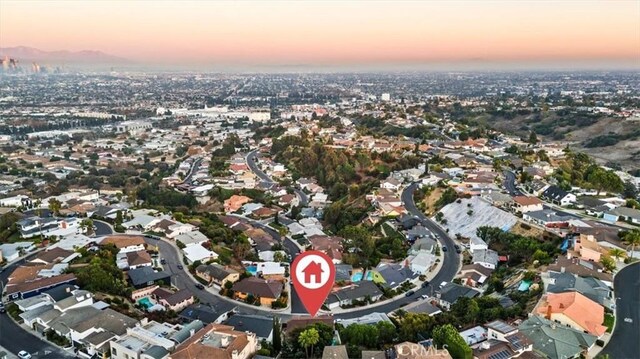 birds eye view of property with a residential view