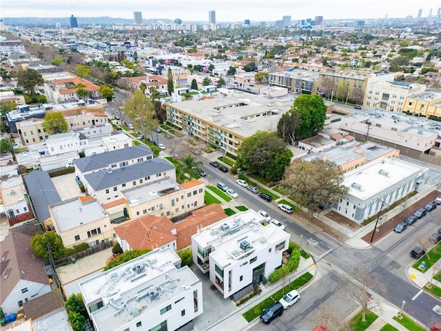 birds eye view of property featuring a city view