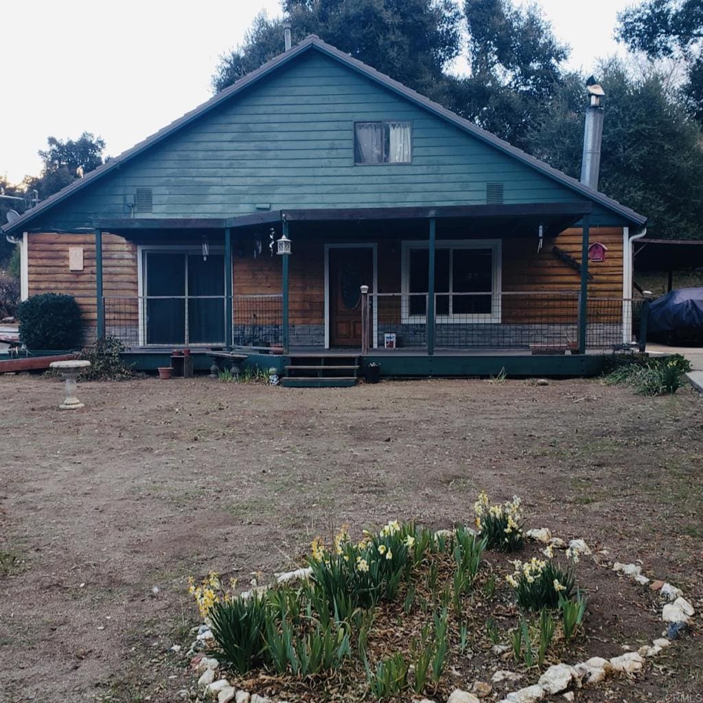 view of front of house featuring covered porch