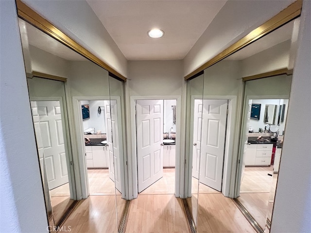 hall featuring light wood-style floors