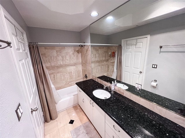 bathroom with shower / bath combination with curtain and vanity