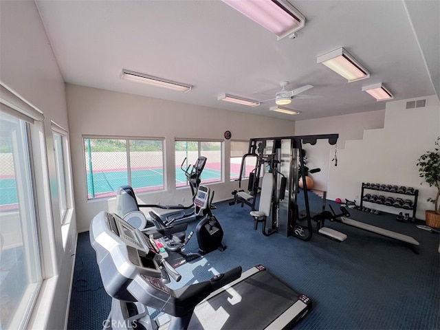 exercise room featuring ceiling fan and visible vents