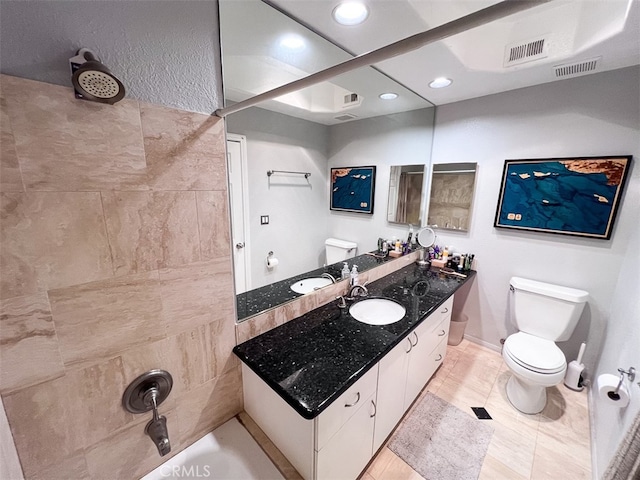 bathroom featuring recessed lighting, visible vents, toilet, vanity, and walk in shower