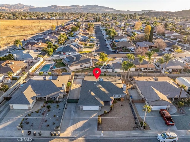 bird's eye view with a residential view and a mountain view