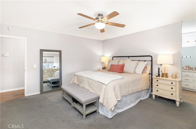 bedroom with a ceiling fan and baseboards