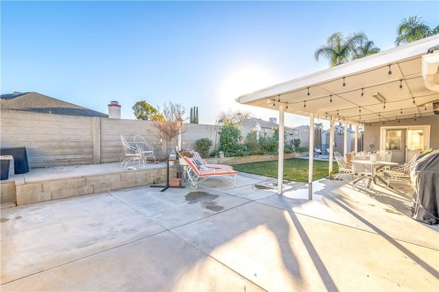 view of patio / terrace featuring fence private yard and outdoor dining space