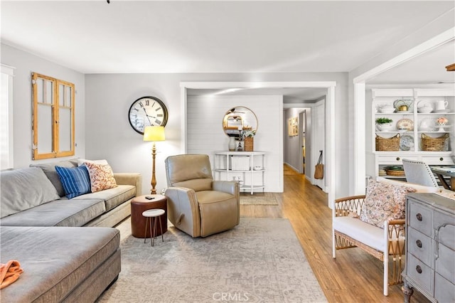 living room with wood finished floors