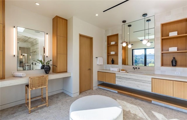 full bathroom featuring baseboards, vanity, and recessed lighting