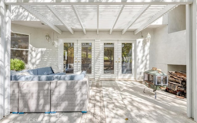 view of patio featuring an outdoor hangout area and a pergola