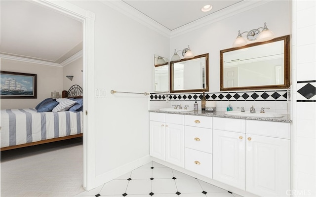 bathroom featuring ensuite bath, ornamental molding, backsplash, and a sink