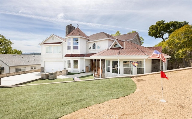 3105 E Beach Cir, Bradley, CA 93426 - back of house featuring stucco siding, concrete driveway, a yard, and a garage