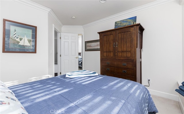 unfurnished bedroom featuring carpet floors, ornamental molding, and baseboards