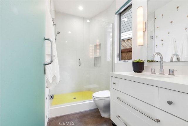 full bathroom featuring toilet, a shower stall, and vanity