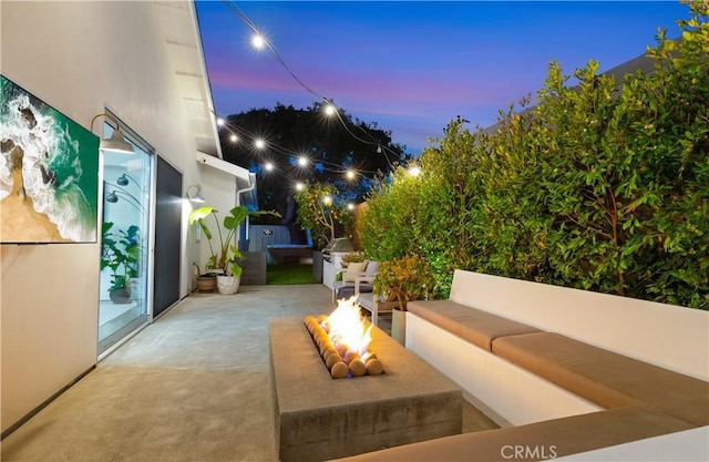 223 Robinhood Pl, Costa Mesa, CA 92627 - view of patio with an outdoor living space with a fire pit