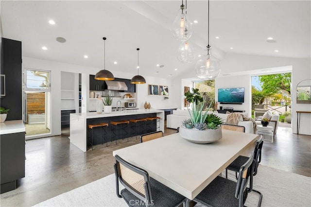223 Robinhood Pl, Costa Mesa, CA 92627 - dining area featuring finished concrete flooring, plenty of natural light, vaulted ceiling, and recessed lighting