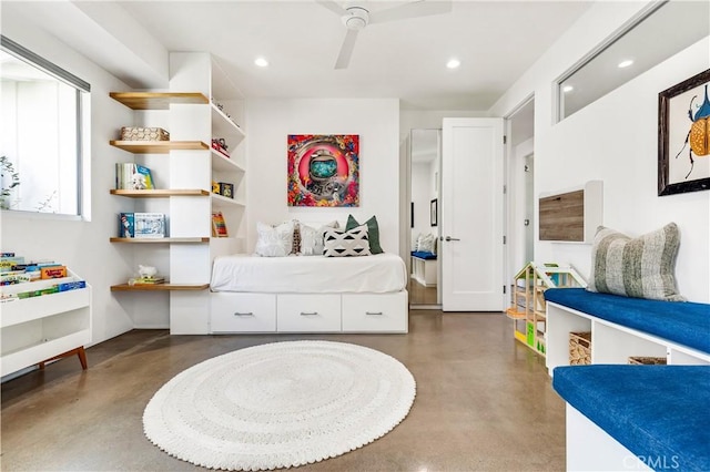 bedroom with finished concrete flooring, a ceiling fan, and recessed lighting