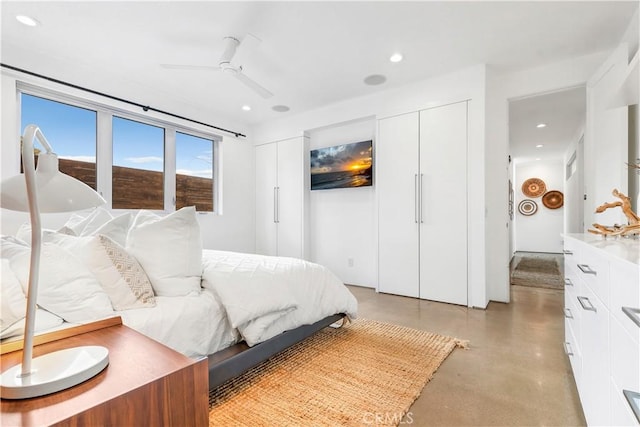 223 Robinhood Pl, Costa Mesa, CA 92627 - bedroom featuring multiple closets, recessed lighting, finished concrete floors, and a ceiling fan