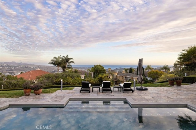 outdoor pool featuring a patio area