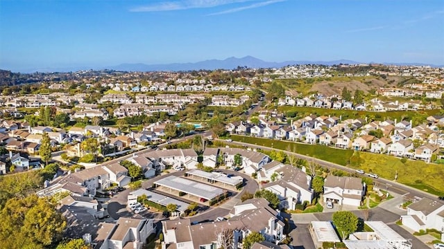 bird's eye view with a residential view and a mountain view