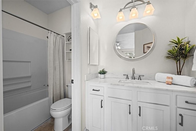 full bathroom featuring shower / bath combo, vanity, and toilet