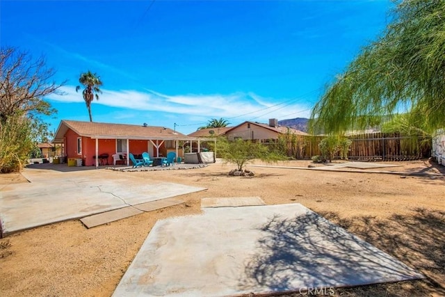 view of yard with a patio area and fence