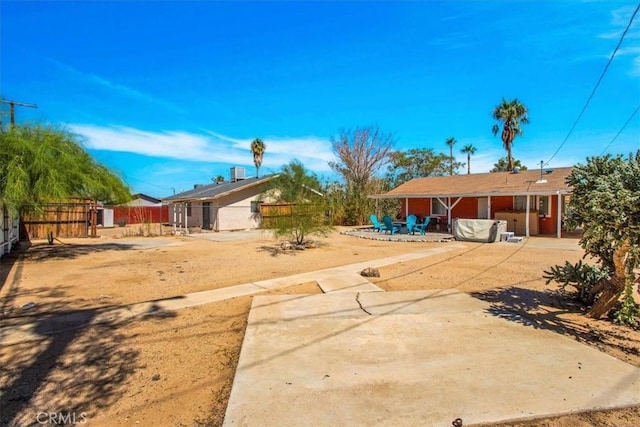 view of yard with a patio area and fence