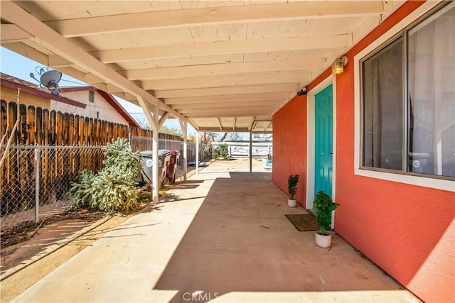 view of patio / terrace featuring fence