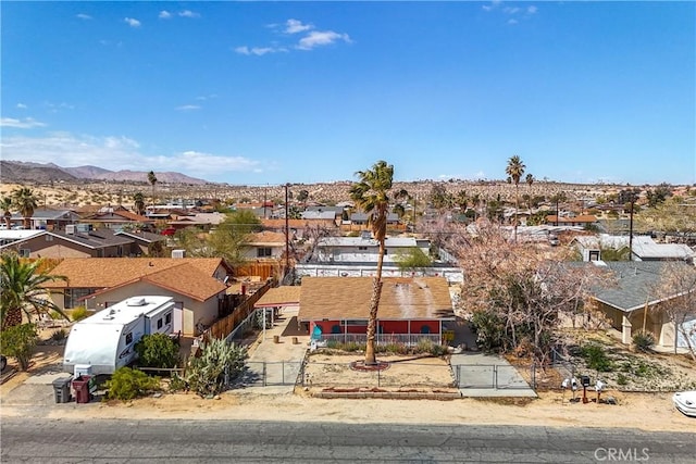 bird's eye view featuring a mountain view and a residential view