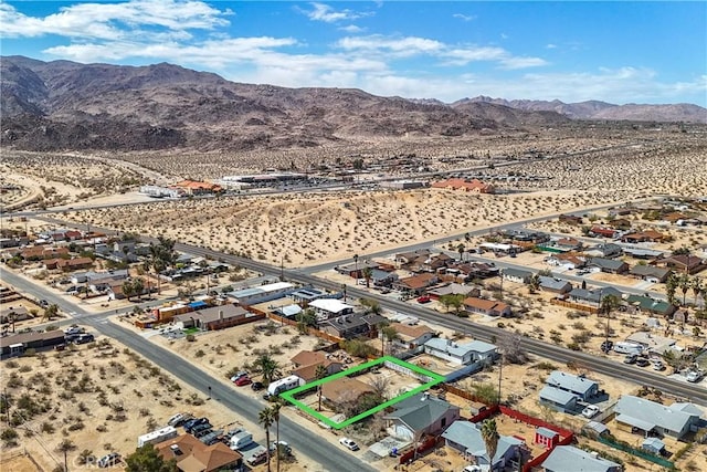 bird's eye view featuring view of desert and a mountain view