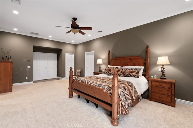 bedroom with recessed lighting, carpet floors, visible vents, baseboards, and crown molding