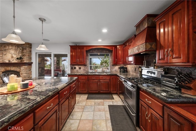 kitchen featuring stainless steel gas stove, dark brown cabinets, tasteful backsplash, and custom range hood