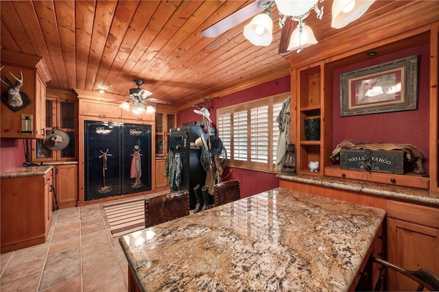 kitchen featuring ceiling fan, light tile patterned floors, wood ceiling, and light stone countertops