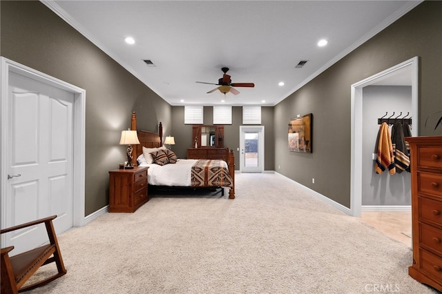 bedroom featuring light carpet, baseboards, and crown molding