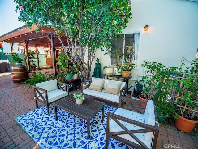 view of patio featuring grilling area and outdoor lounge area