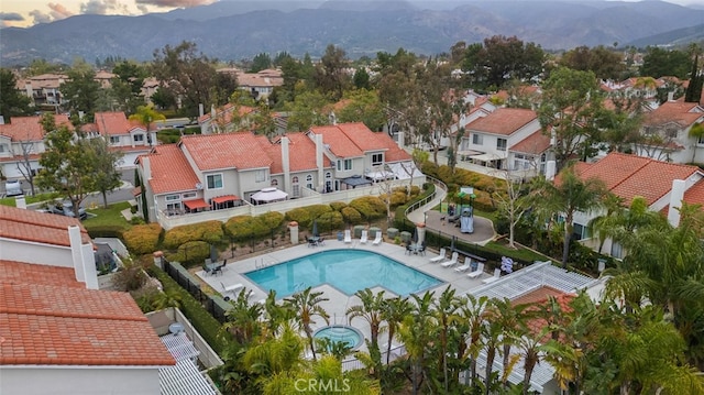 aerial view featuring a residential view and a mountain view