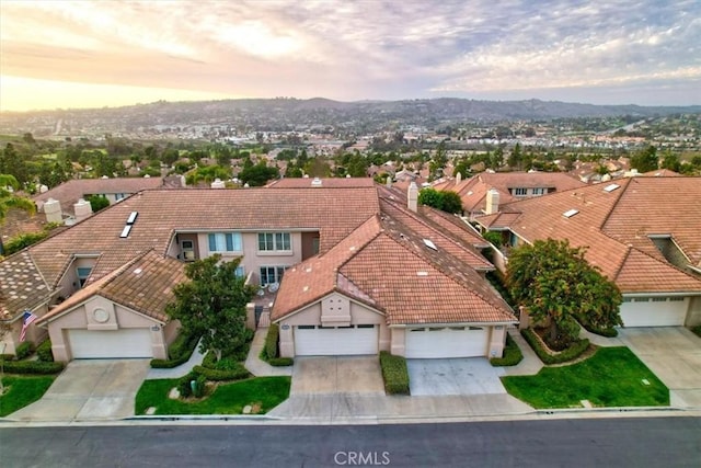 aerial view at dusk with a residential view