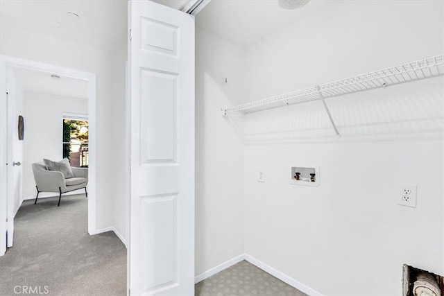 laundry area with baseboards, light carpet, hookup for a washing machine, and laundry area