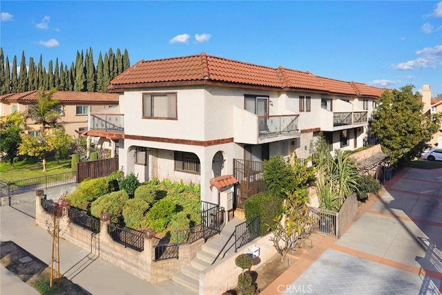 view of property with fence