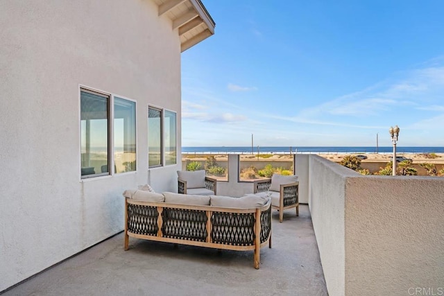 balcony with a sunroom and an outdoor living space