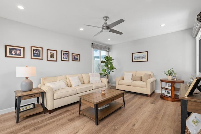 living room featuring light wood-style floors, recessed lighting, baseboards, and a ceiling fan