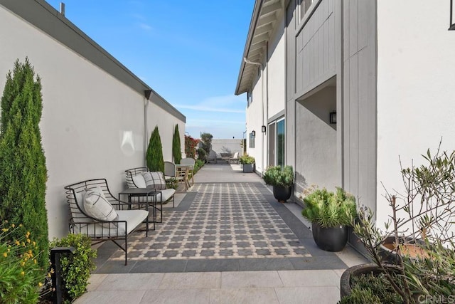 surrounding community with a patio area