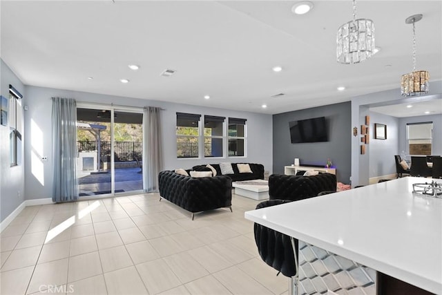 kitchen featuring a notable chandelier, light tile patterned floors, recessed lighting, visible vents, and baseboards