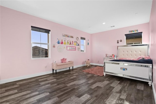 bedroom featuring recessed lighting, wood finished floors, visible vents, and baseboards