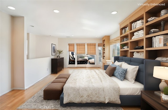 bedroom featuring light wood-style floors, baseboards, and recessed lighting