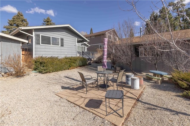 back of house featuring a patio area